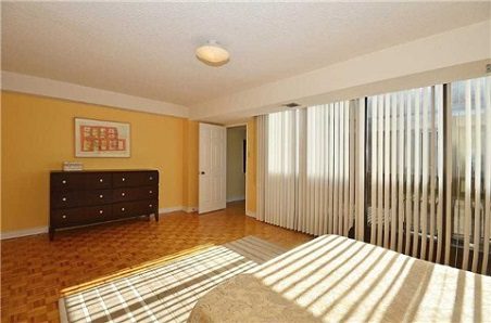 Dated Condo - Vertical Blinds